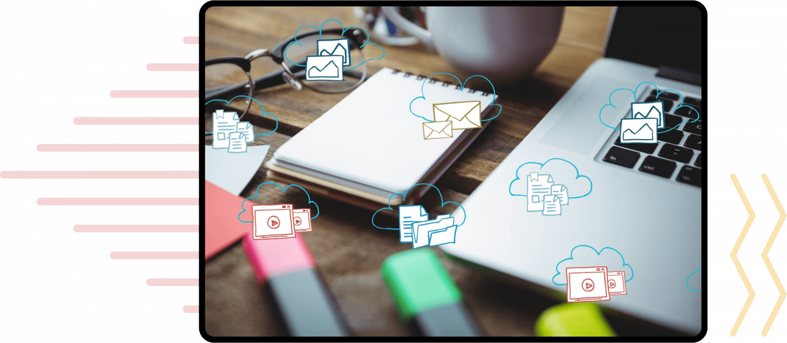 business desk showing notebook and laptop